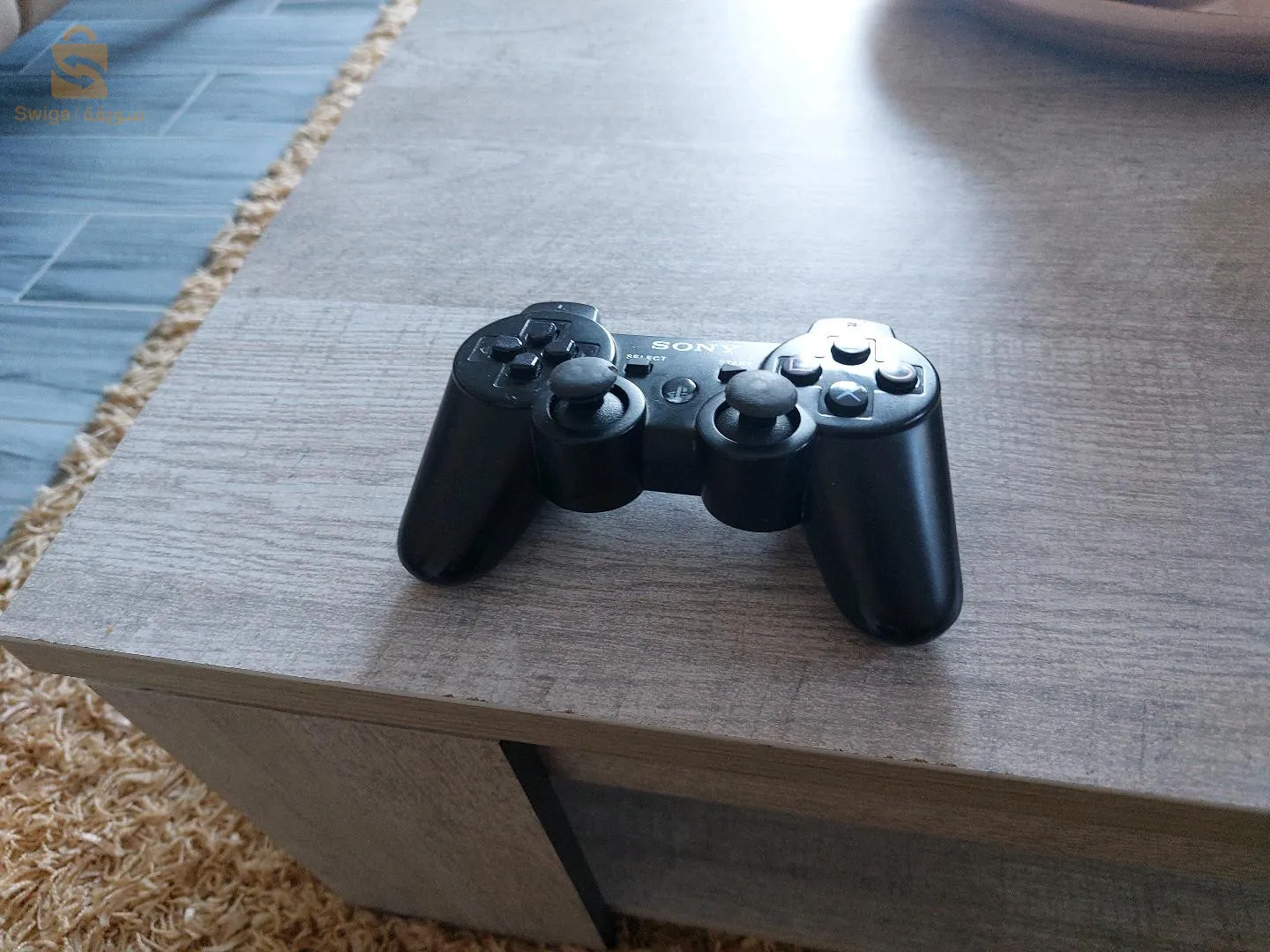 PS3 Slim blanche trés bonne état avec manette d'origine