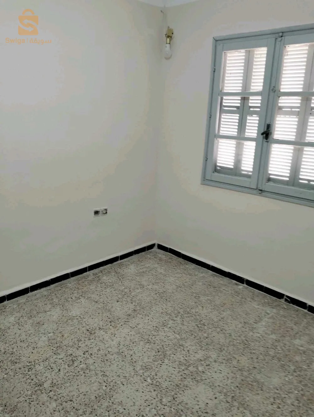 شقة F3 في الطابق الثالث حي الباطن بوسعادة مقابلة جامع احمد حماني