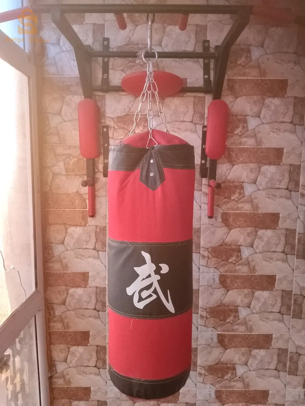sac de boxe avec gym barre