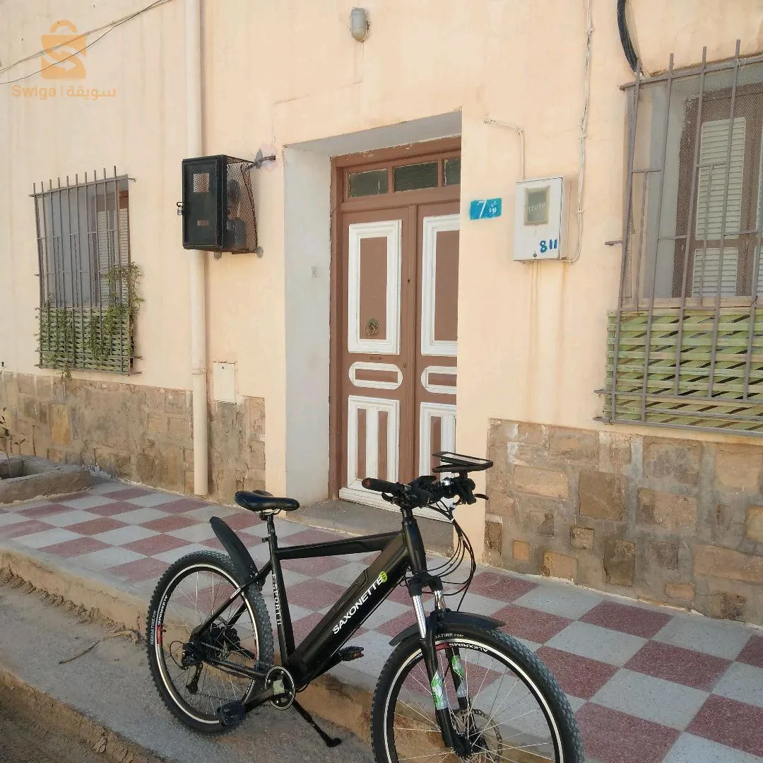 منزل للبيع بدفتر عقاري بواجهتين  لباغي يشري يتصل على الرقم المكتوب في اللوحة