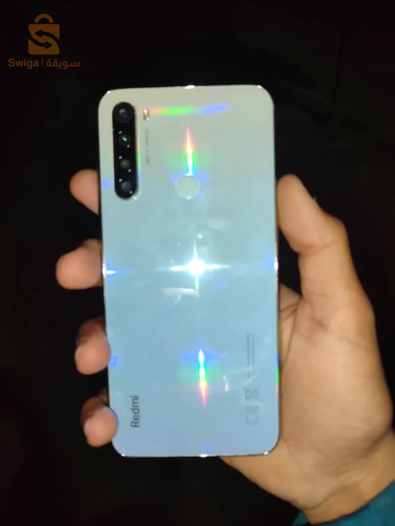 avec la boîte et chargeur