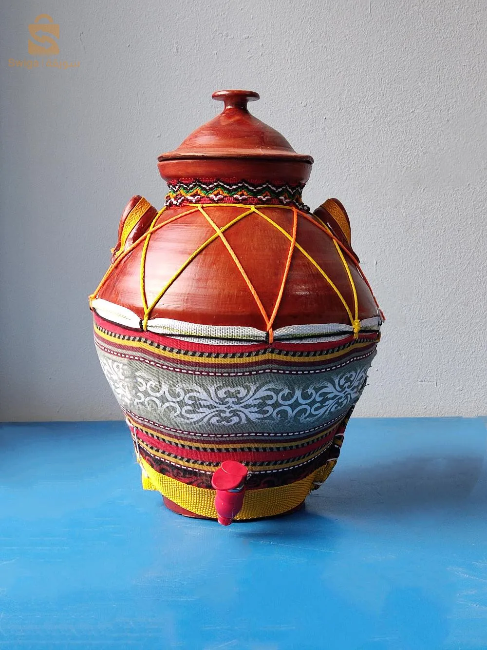 ڨلاسيار من الفخار للماء و تزيين المائدة