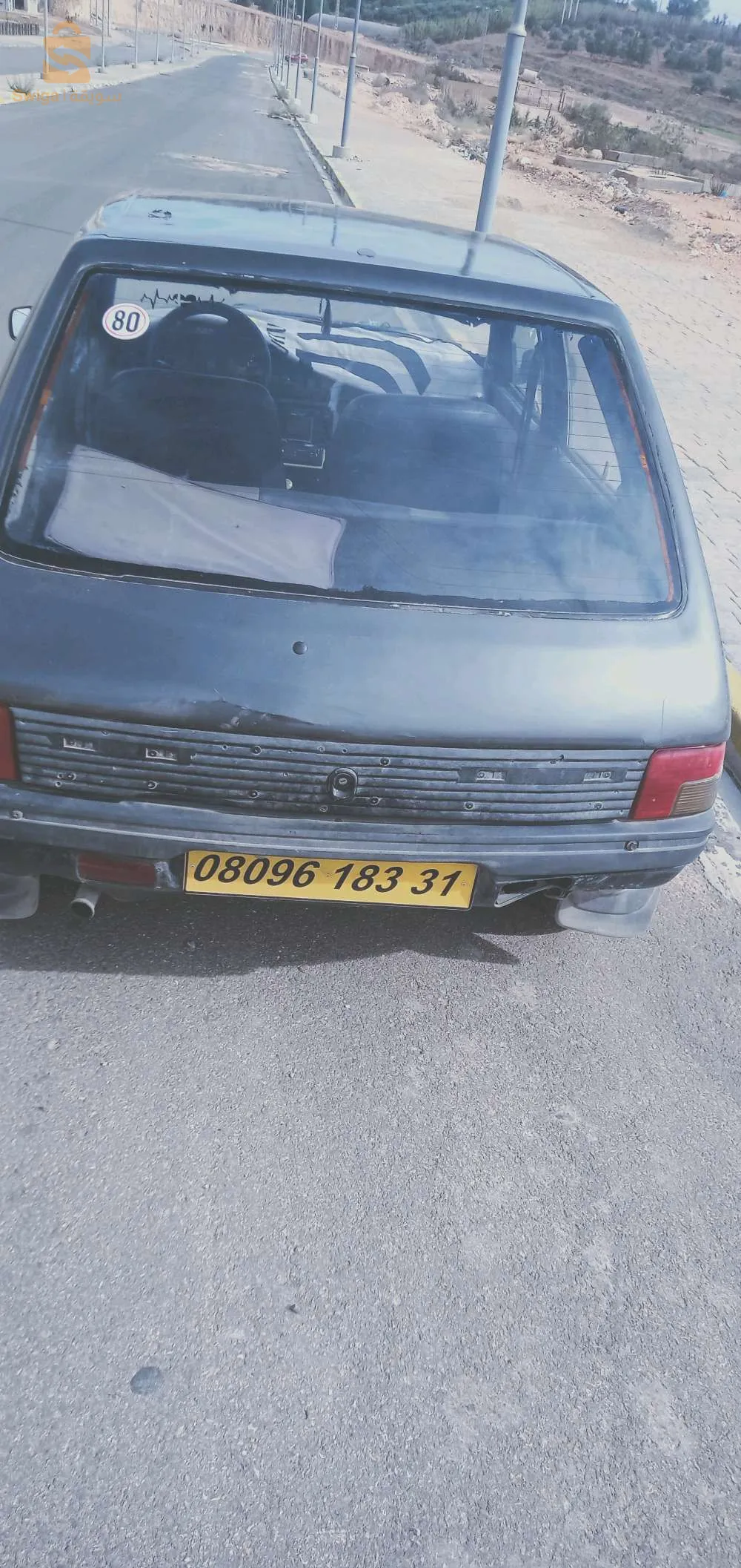 سيارة205 لاباس بيها