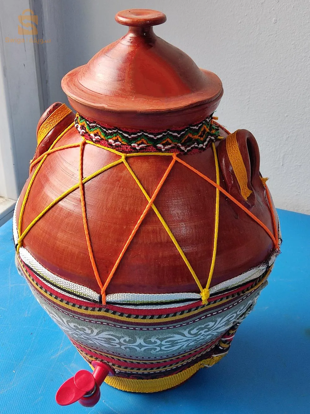 ڨلاسيار من الفخار للماء و تزيين المائدة