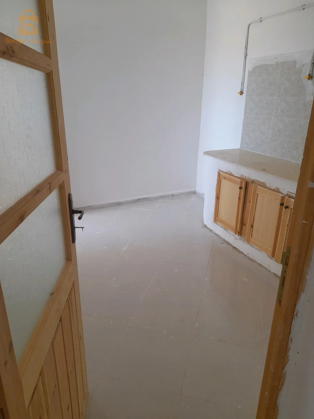 location f3 6 eme étage avec ascenseur se situe au cité 60+20 logements lpa sn métal bendaoued relizane