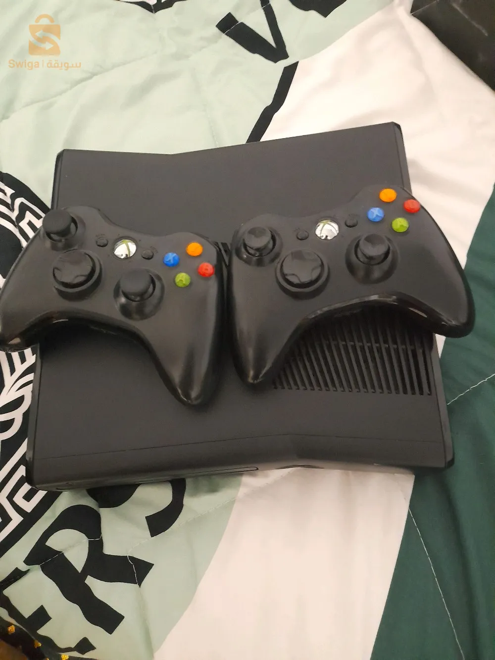 xbox 360 2 manette 25 jeux plus des cd négociable