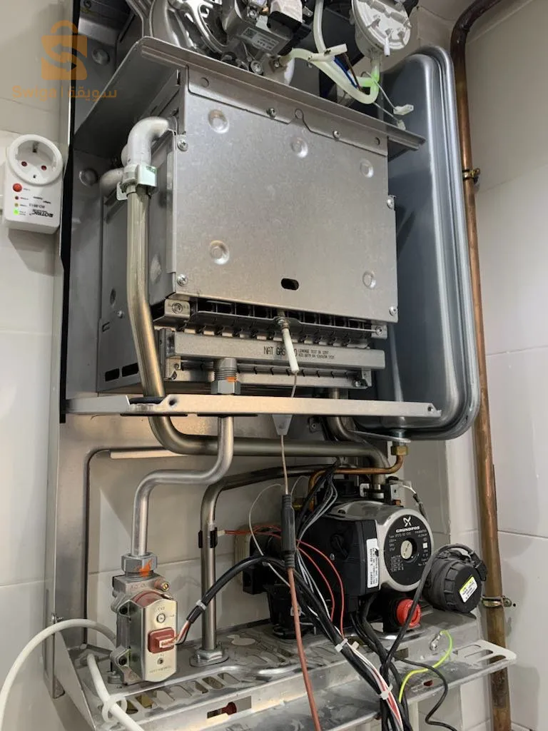 technicien chaudière réparation carte mère installation chauffage central