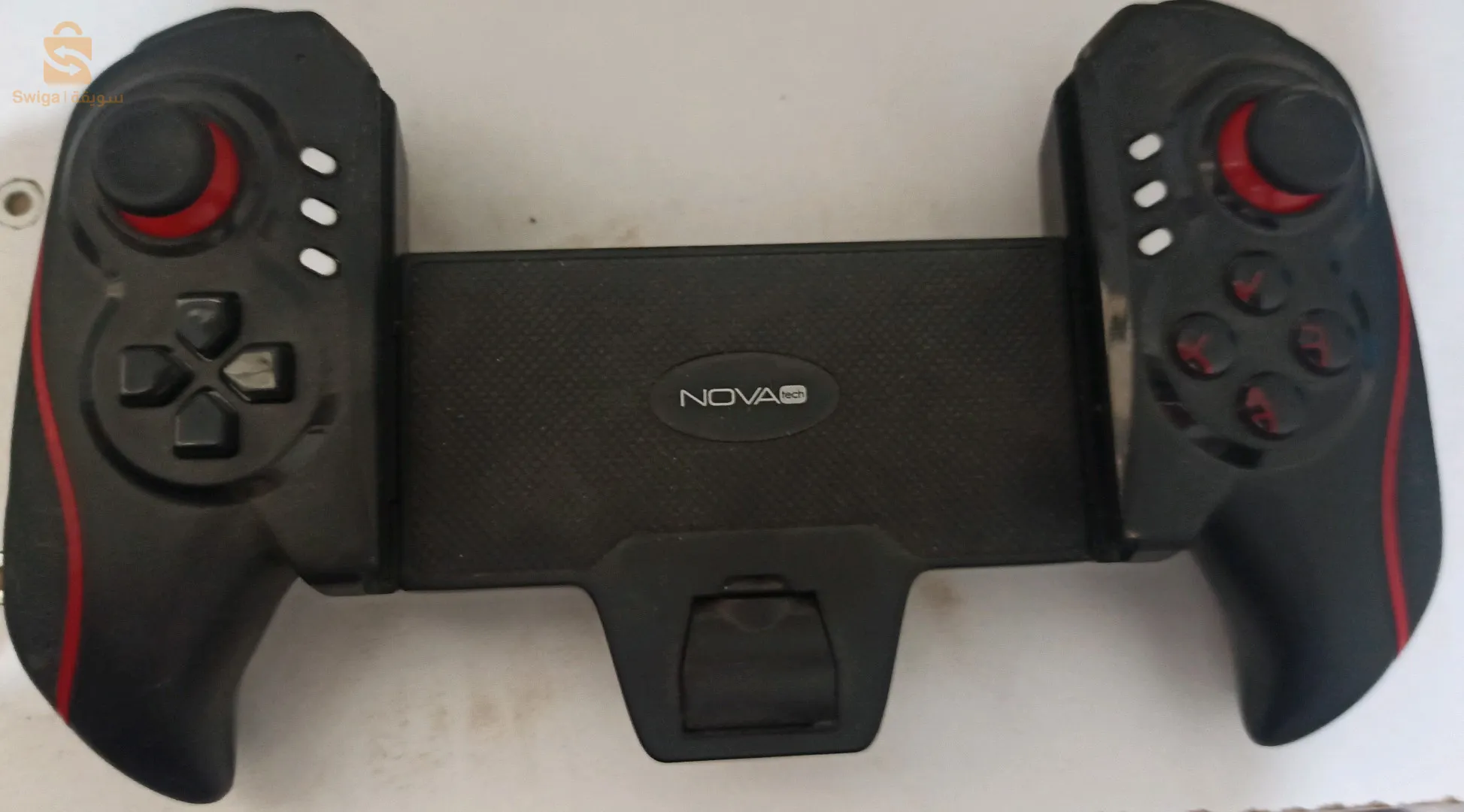 جهاز تحكم العاب في الهاتف بل شاحن لم يستعمل