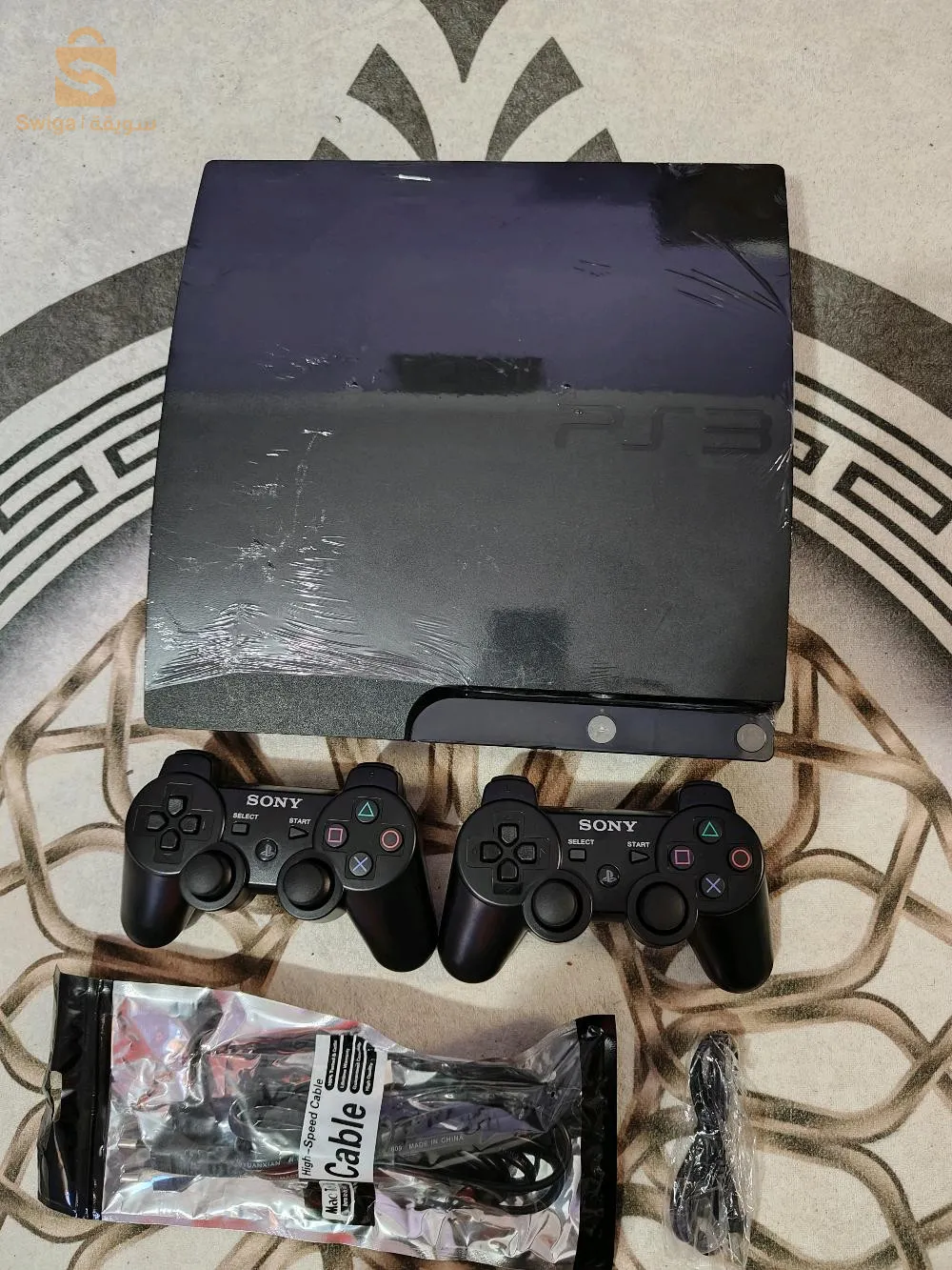 ps3 slim 320gb flaché avec 2 manett
