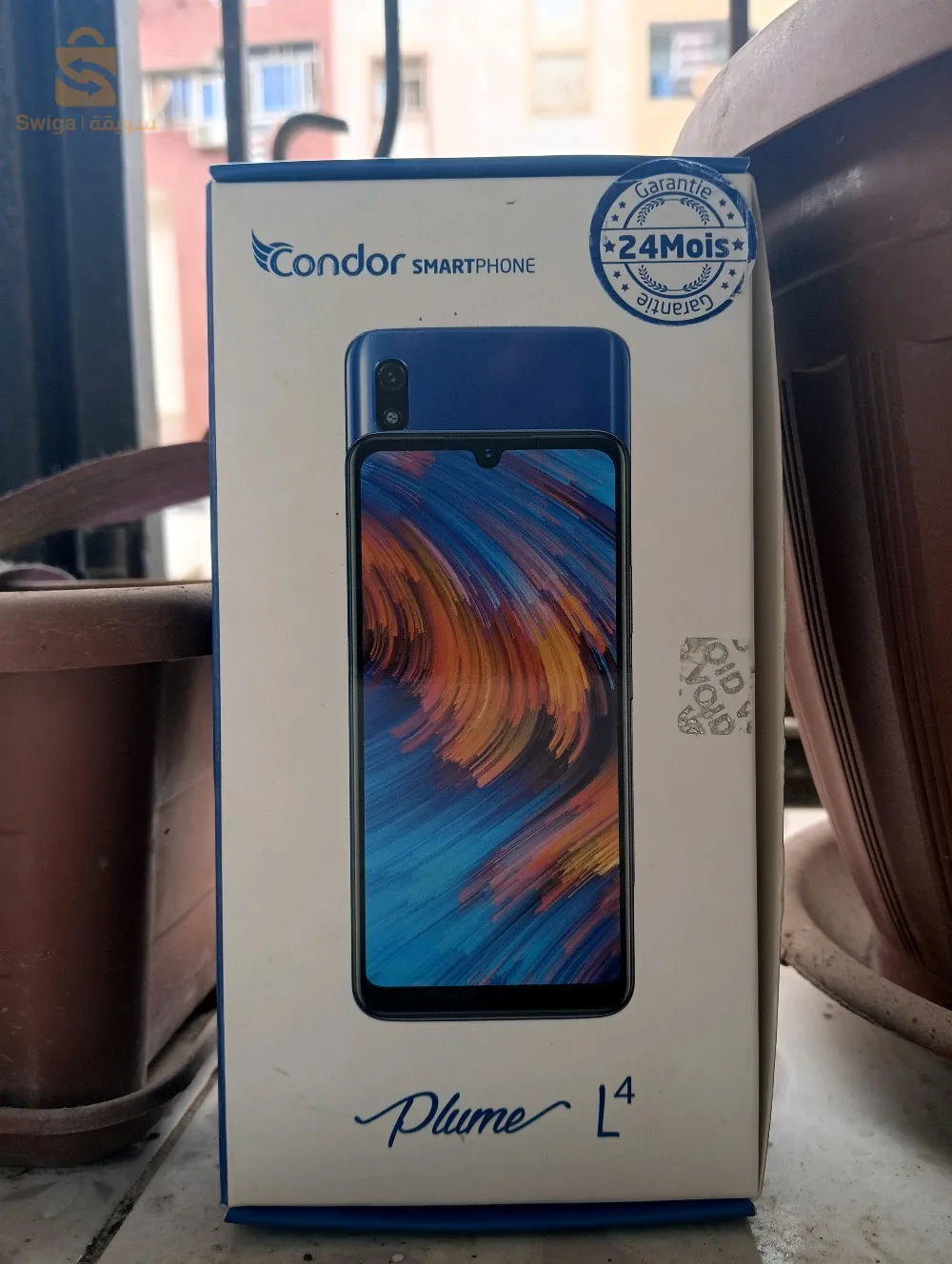 condor L4 32 GB est 2 ram Avec boit est lancasable est chargeur original
