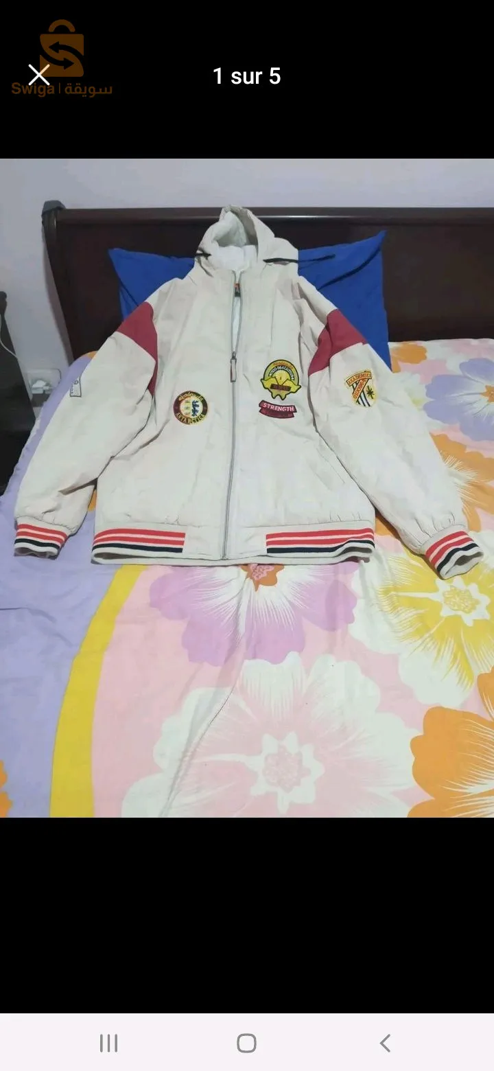 veste chaba belkalmouna fiha derba Sghira kima rahi bayna f la photo haja chaba taille L.