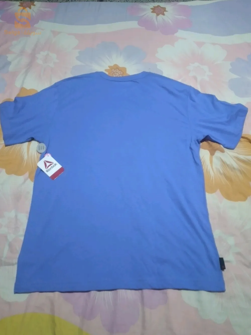T-shirt la Marque Reebok.taille M.haja chaba habat caba.