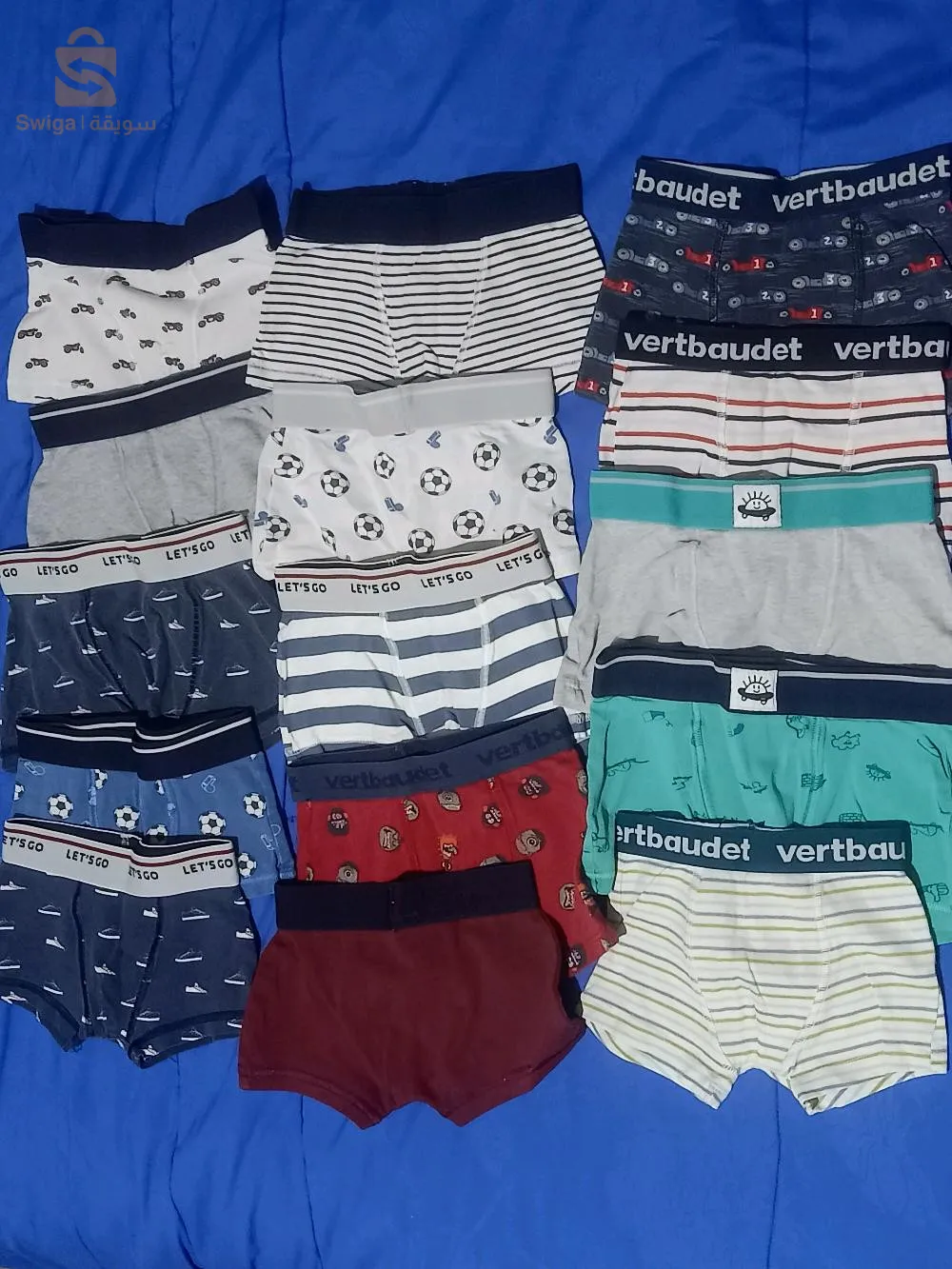 مختلف ملابس و أحذية للأطفال