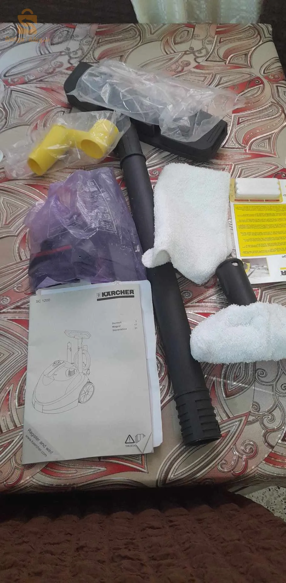 مكنسة كهربائية تعمل بالبخار