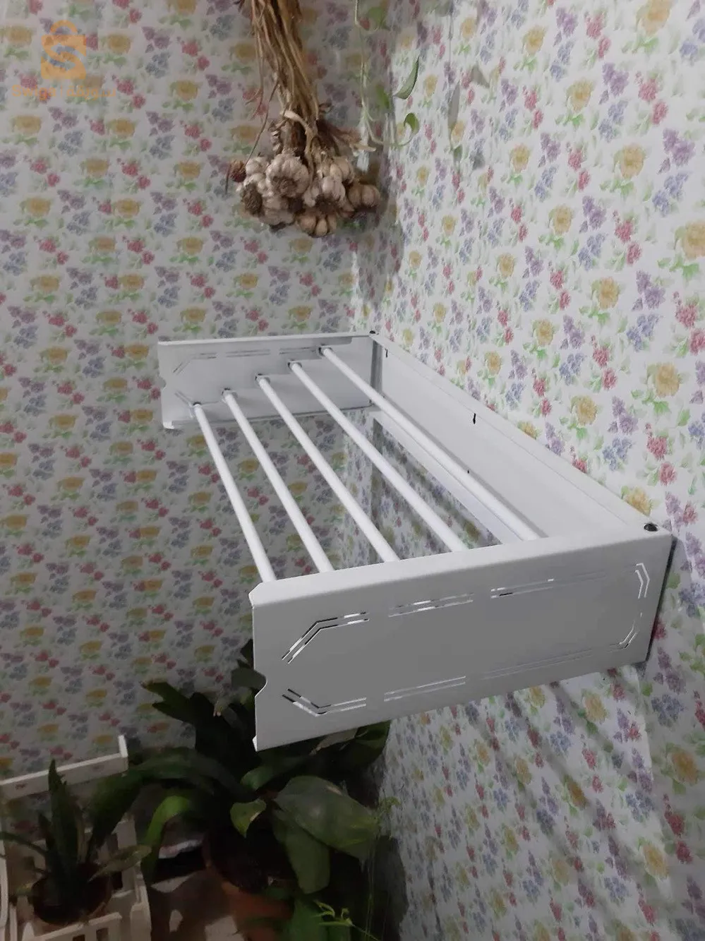 séche linge /مُجفف الملابس