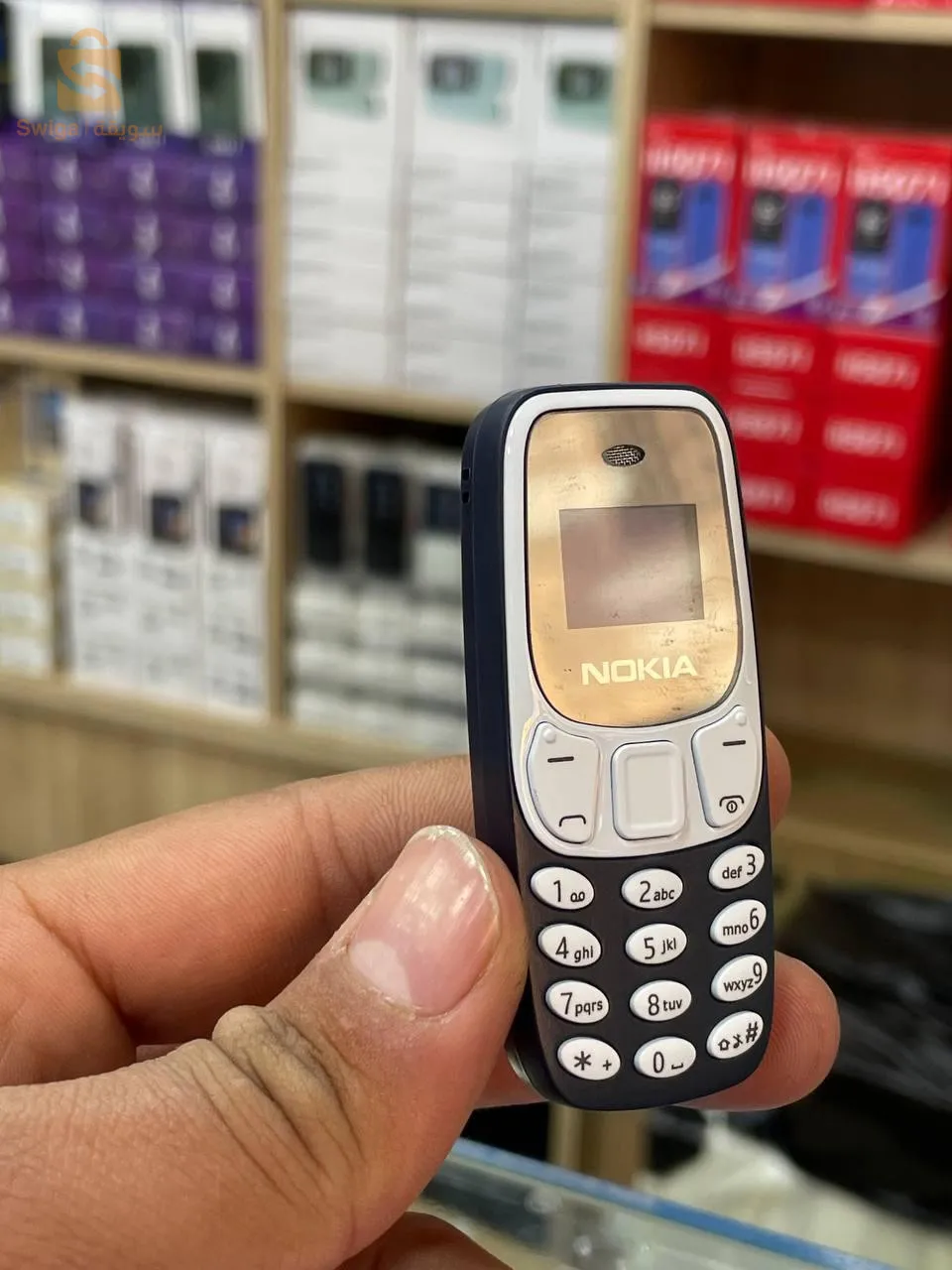 Petit Téléphone Nokia 
Avec support Devenir un écouteur
Trés Bonne qualité ✌️