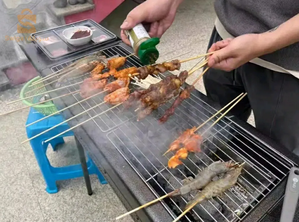 Large rectangular stainless steel portable grill