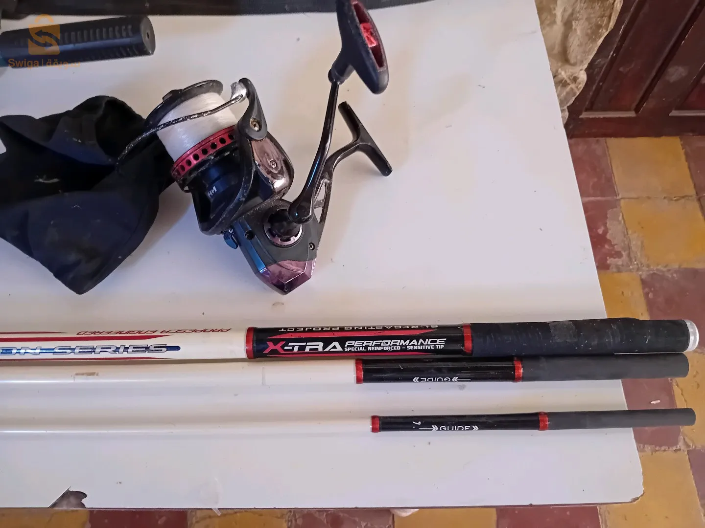 قصب صيد كاربون فيكس و سورفكاستينڨ مع صلاب تليسكوبيك و حاملة القصب (كابة) و ماكينة صيد و بعض اكسيسوارات.