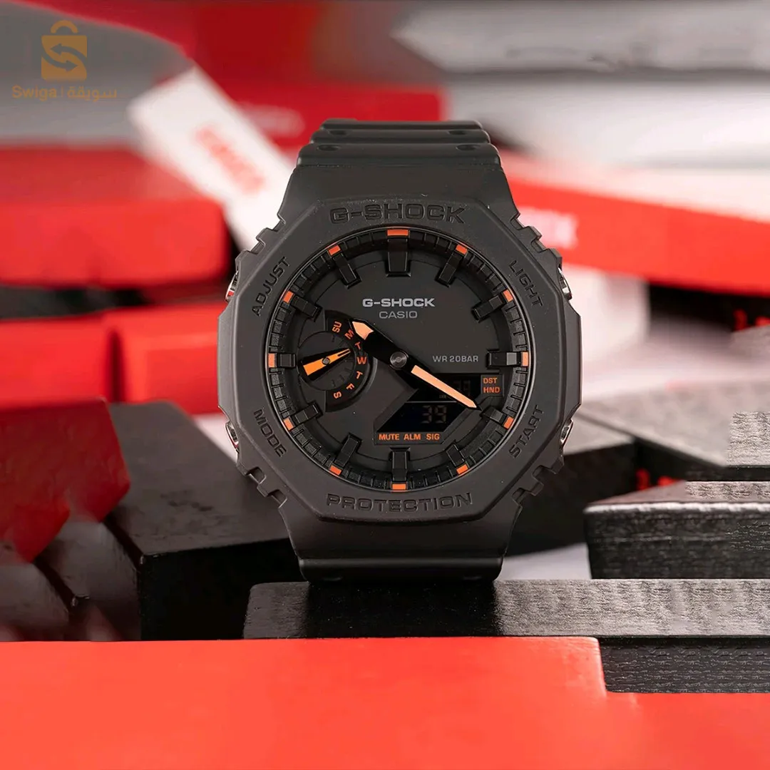 ساعة كاسيو باللون الاسود و البرتقالي 
Montre Casio G-Shock Noir fond noir et orange