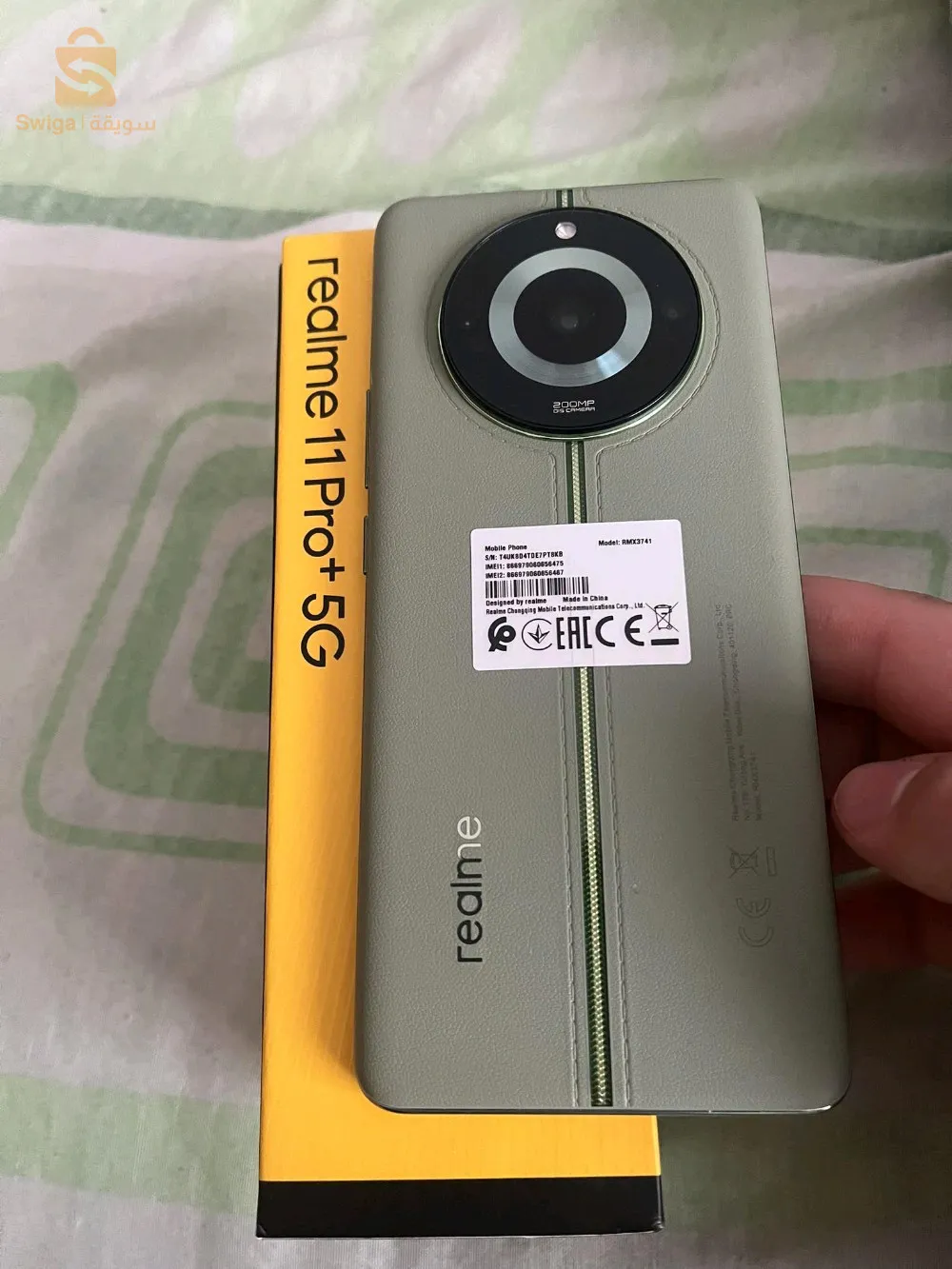 realm 11 pro plus 5g très bon état avec chargeur de 100 w 12ram 512 GB