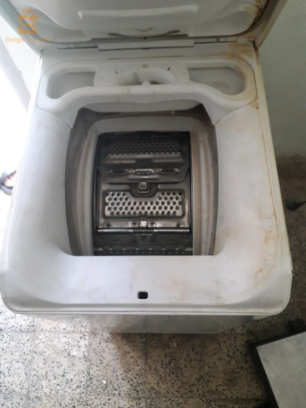 آلة غسيل الملابس