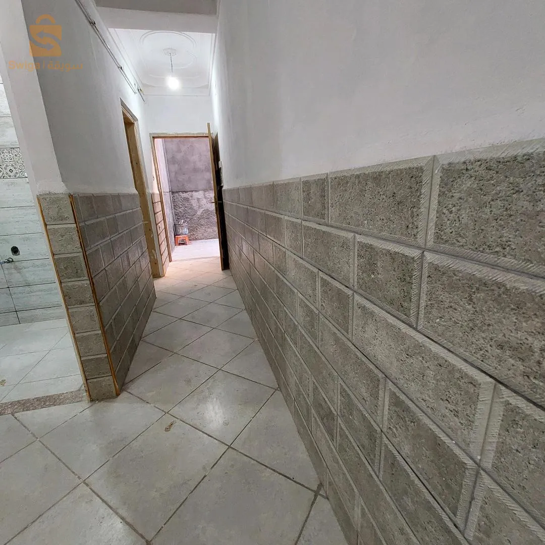 immeuble R+2 de 4 appartements et 3 garages