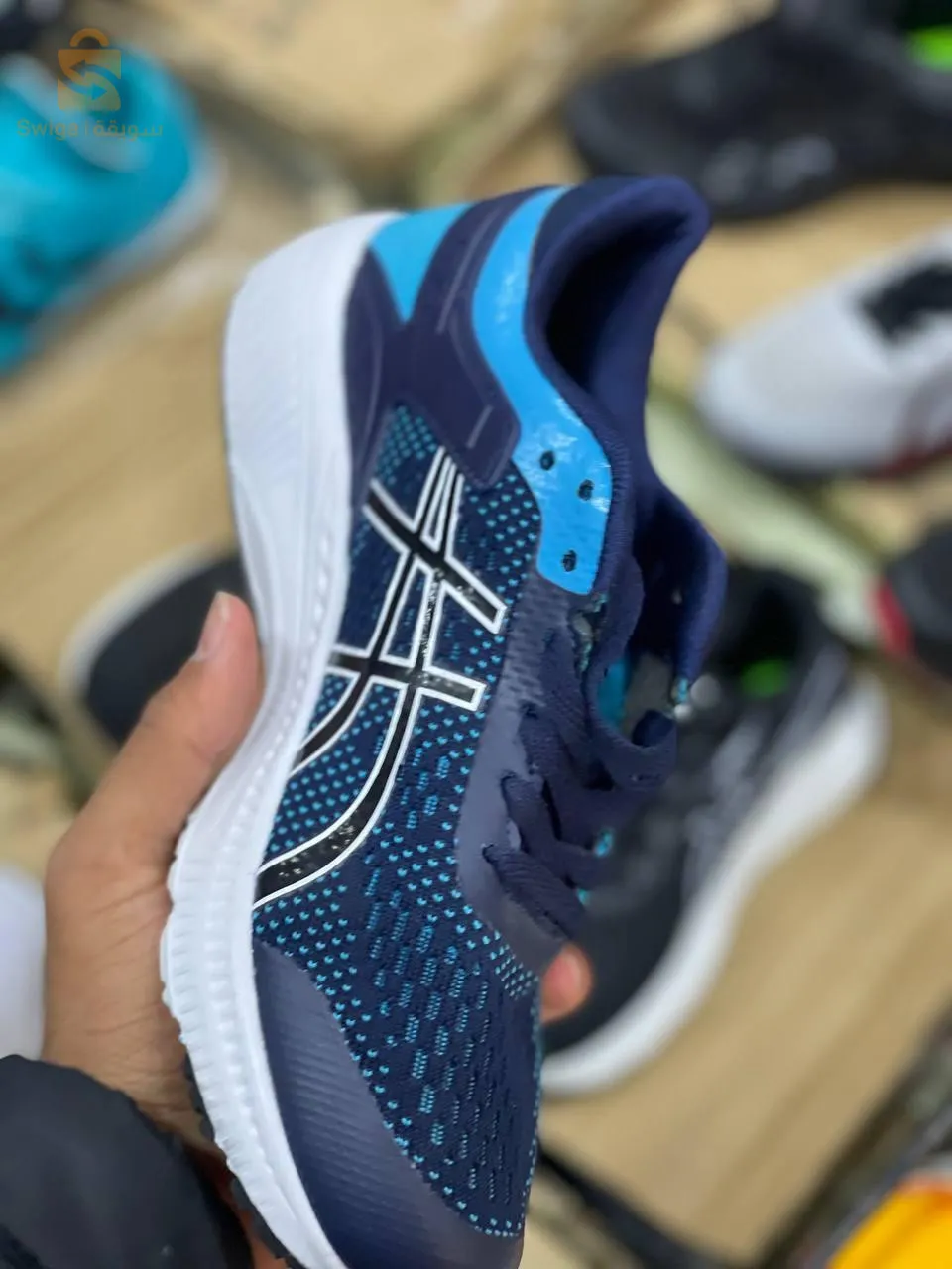 حذاء رياضي asics
