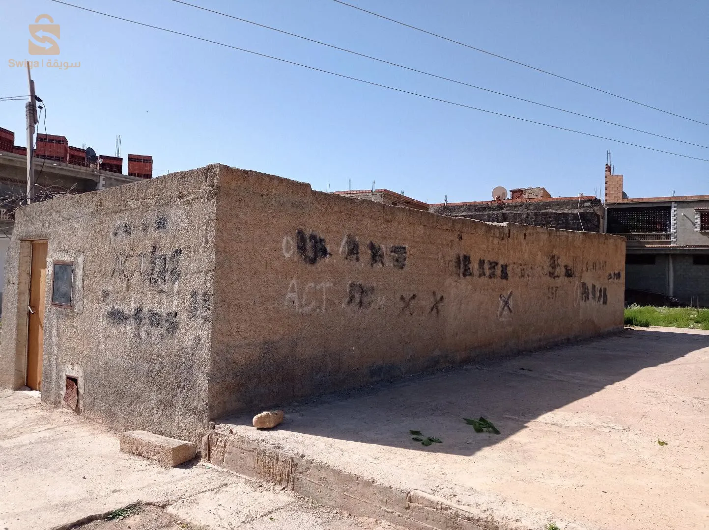 ارض للبيع بها بناء قديم