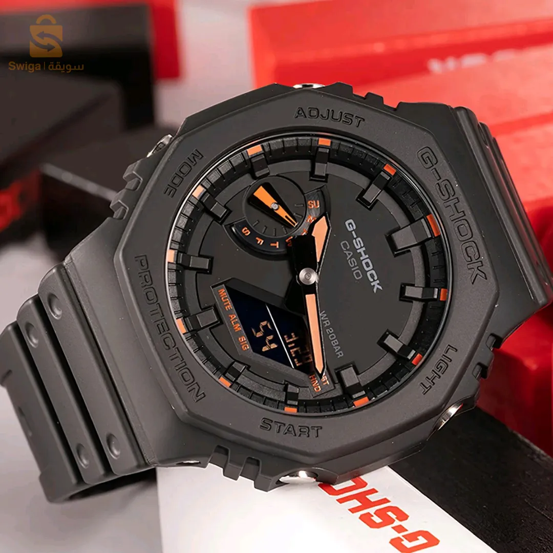 ساعة كاسيو باللون الاسود و البرتقالي 
Montre Casio G-Shock Noir fond noir et orange