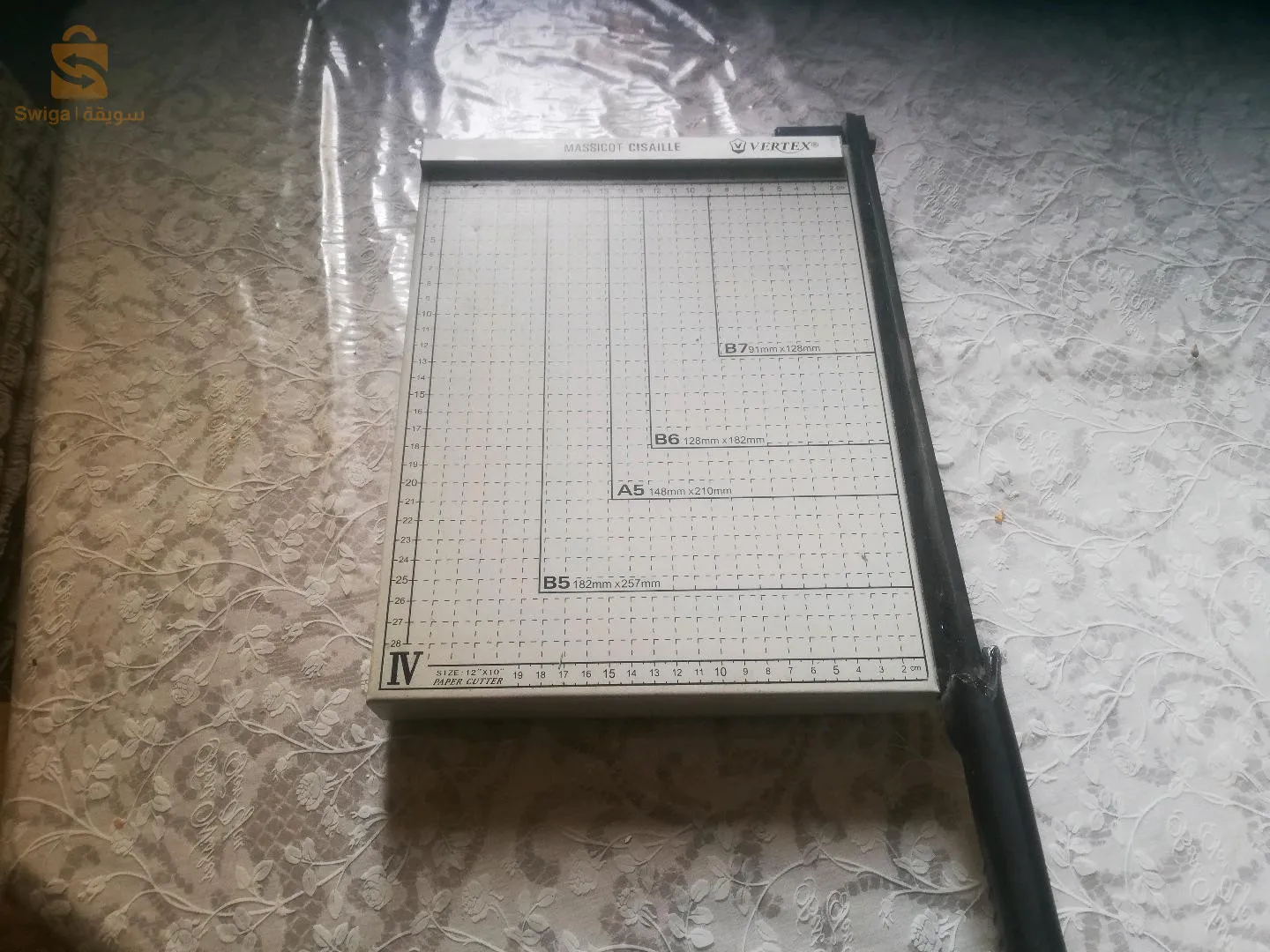 Cisaille papier ordinaire et pboto