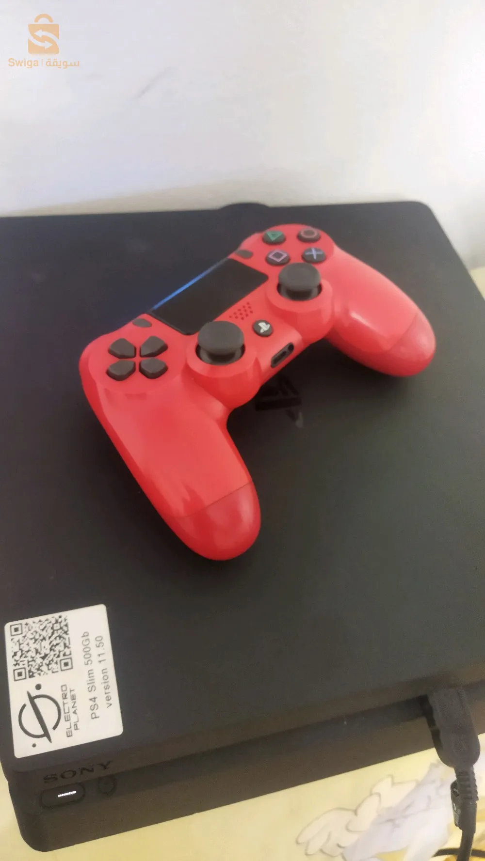 _play 4 slim 500gb_1 manette rouge originale _cable d'alimentation+cable chargeur (manette)_version 11.50_Etat 10/10 avec la boîte_2 cd(pes 2020-fifa 19)+ 8 jeux machriyin