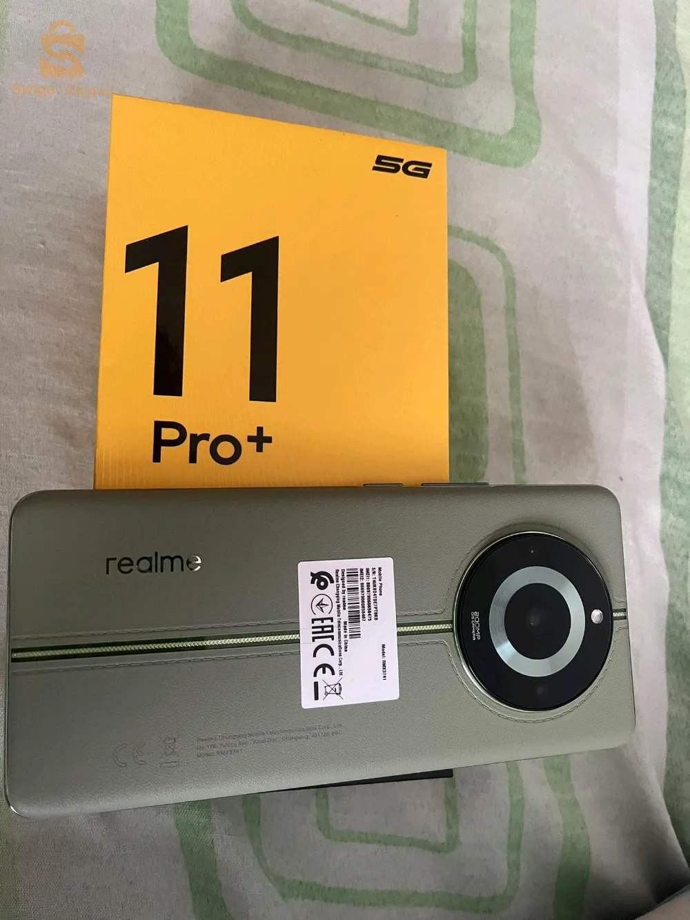 realm 11 pro plus 5g très bon état avec chargeur de 100 w 12ram 512 GB