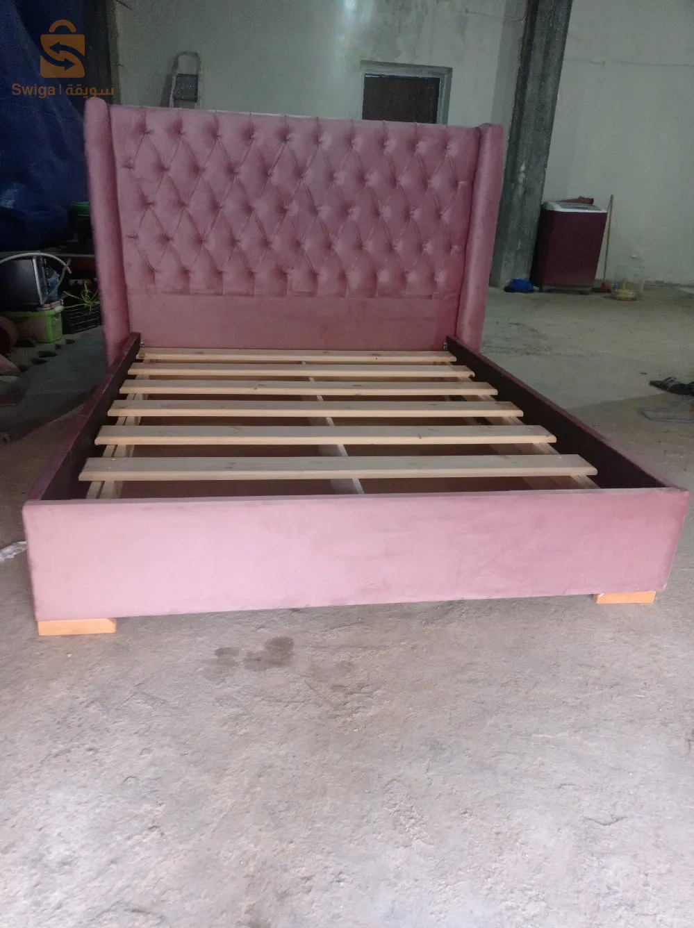 lit capitonné bois de rose