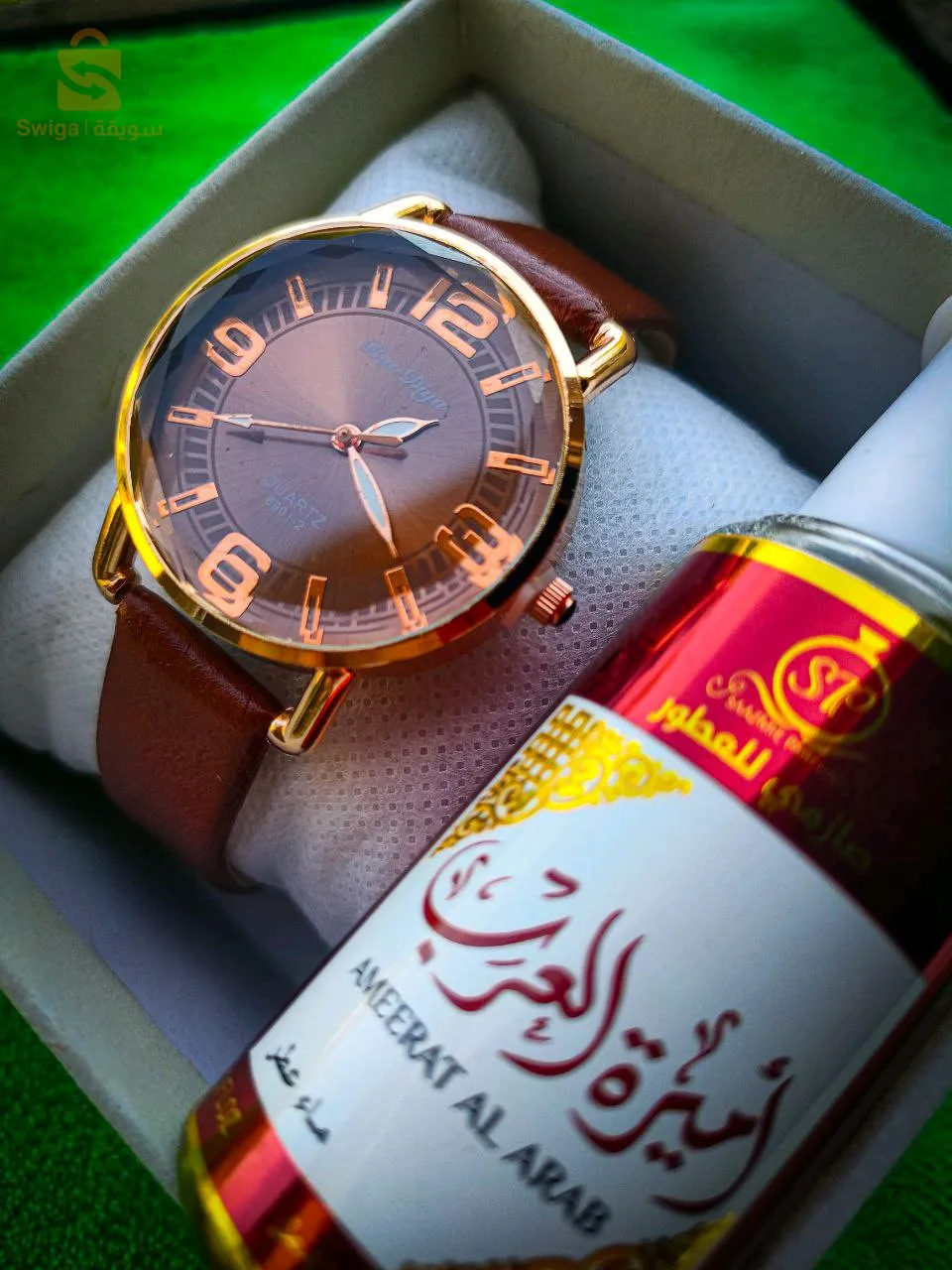 ساعة بحزام جلدي انيق +2براسلي +علبة  او  مع عطر وعلبة بسعر65الف اقل كمية 20 لطلب رقم واتساب