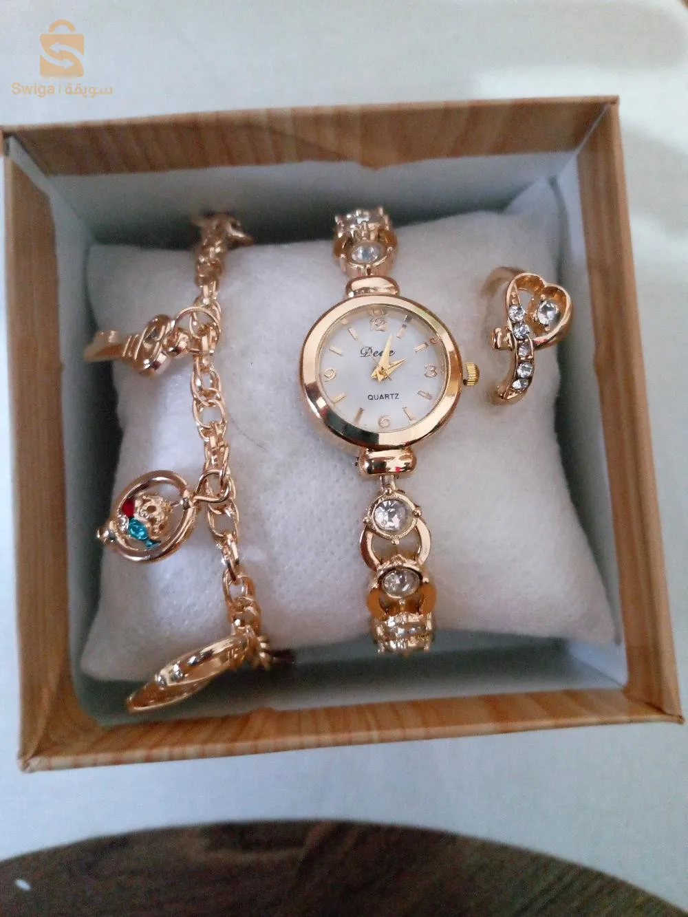 ساعة و مجوهرات
