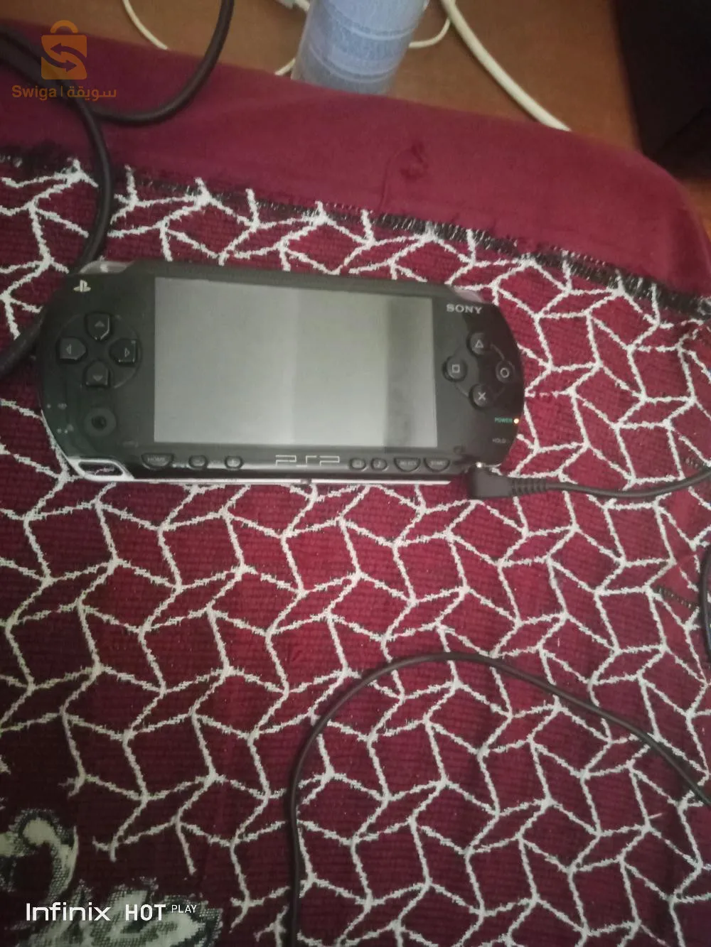 psp1000+شرجار دورجين بحالة جديد