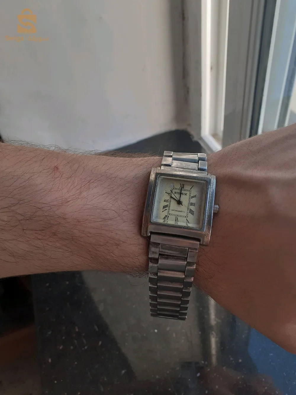 ساعة رجال قديمة