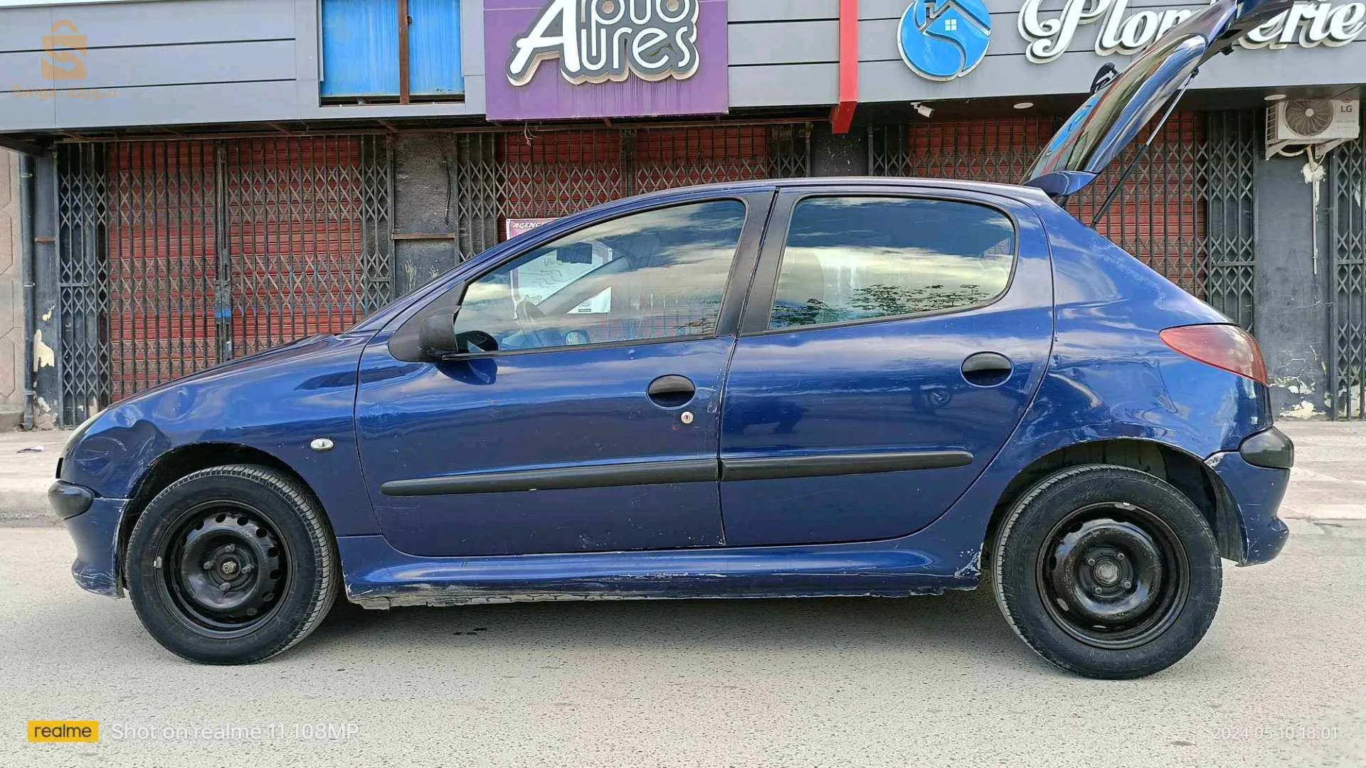 سيارة للبيع نوع بيجو 206