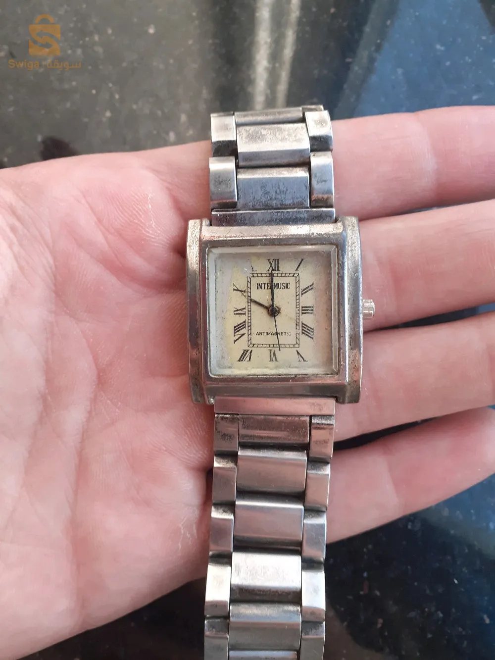 ساعة رجال قديمة