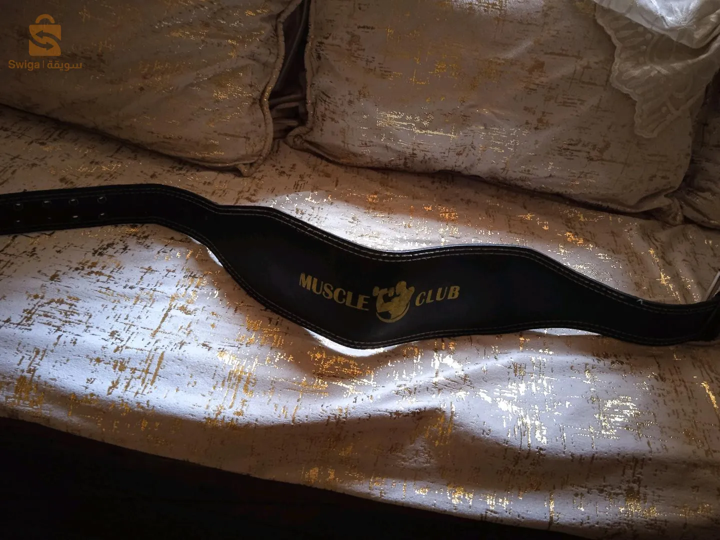 حزام ضهر الحامي عند رفع اوزان