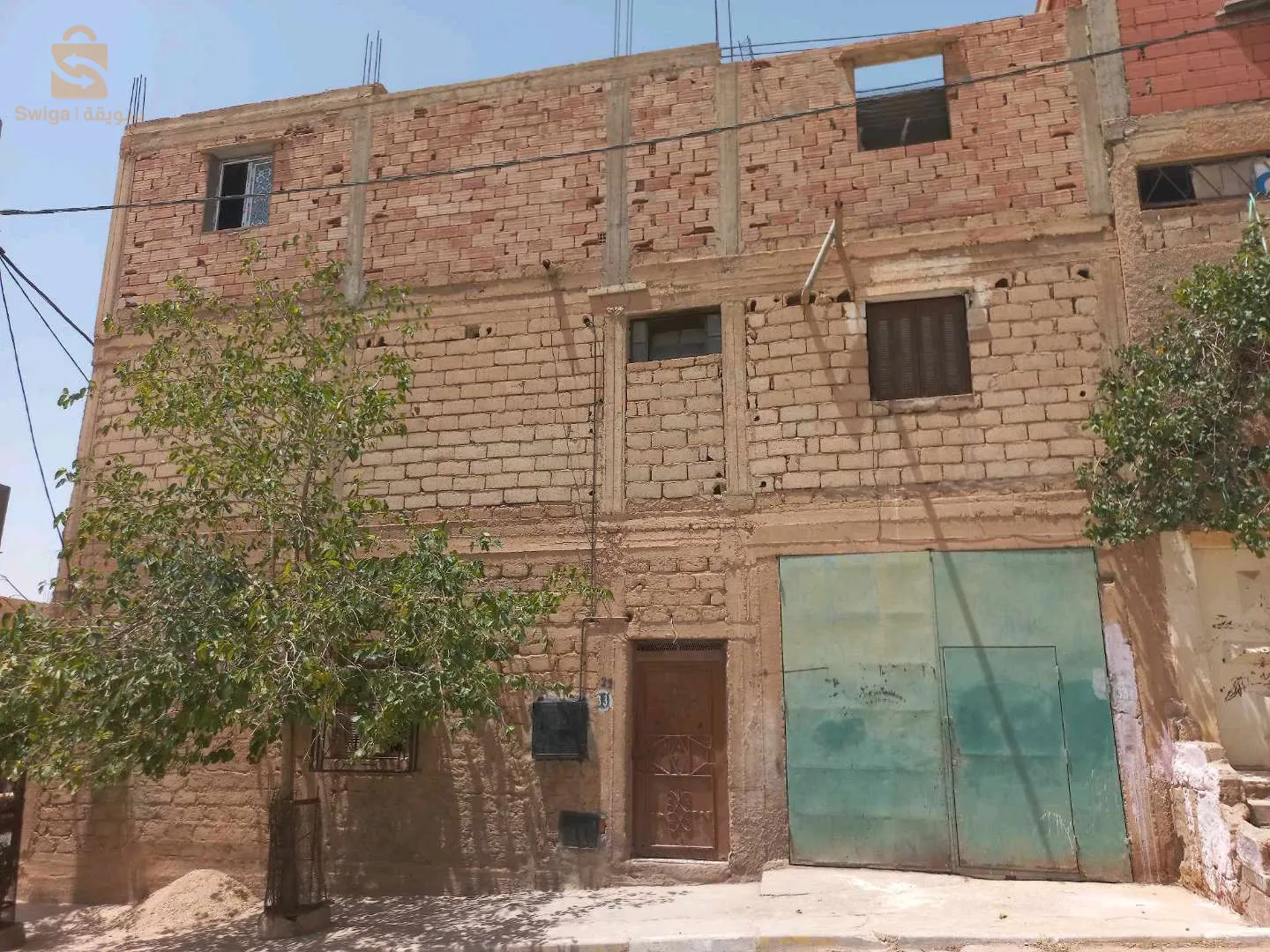 حي بلغزال بناية 615 الباب 22