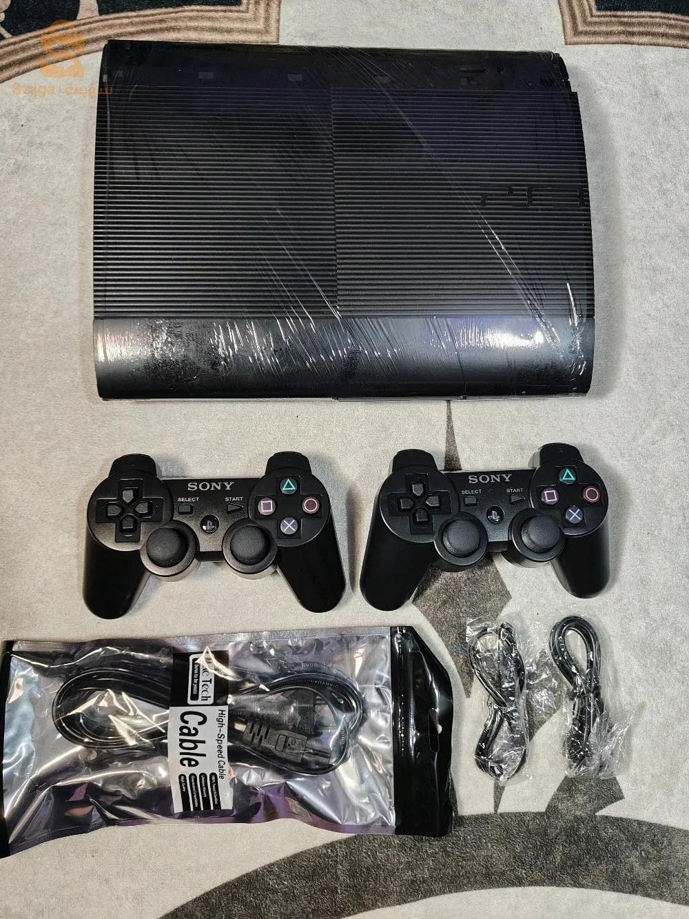 ps3 slim 500gb flaché avec 2 manett