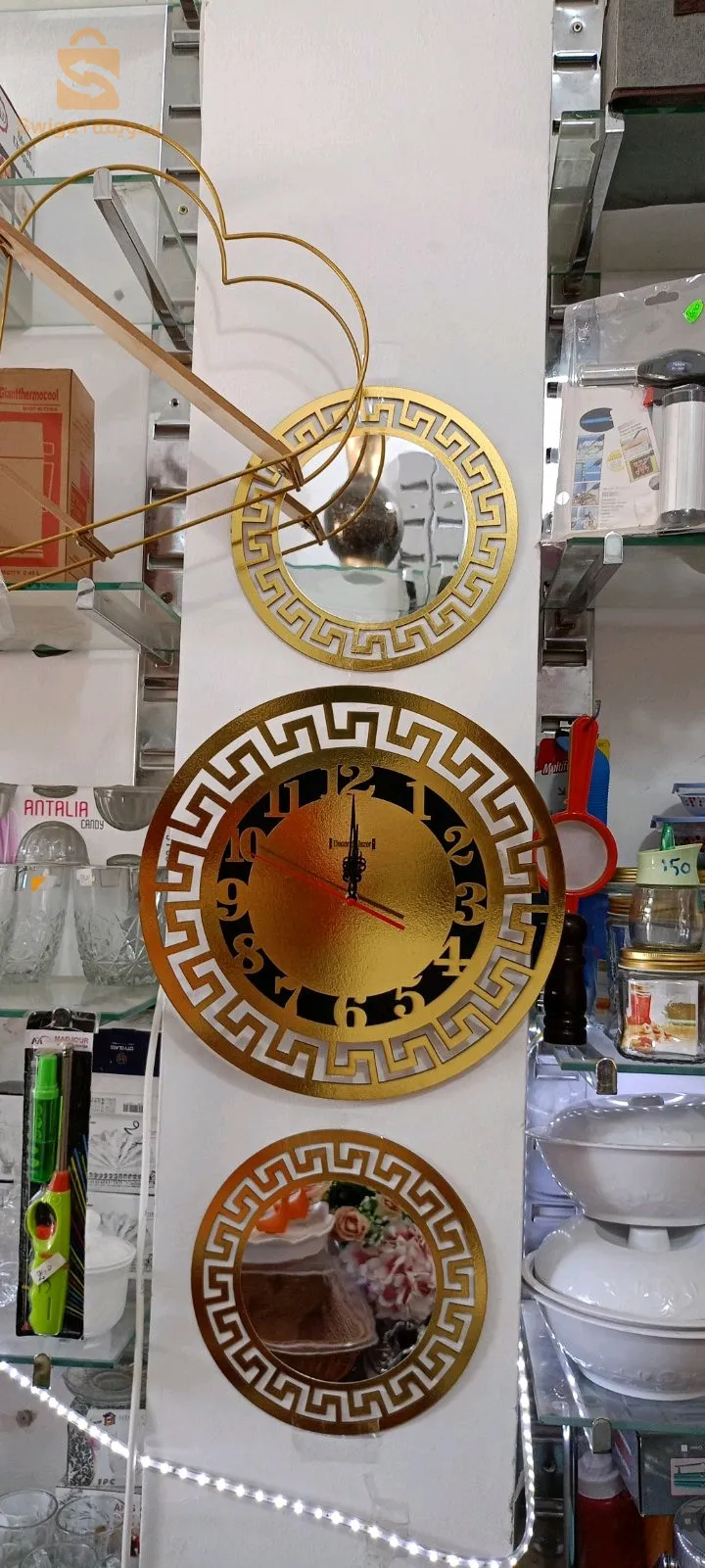 horloge murale..  مع 2 مرأة  ساعة الحائط