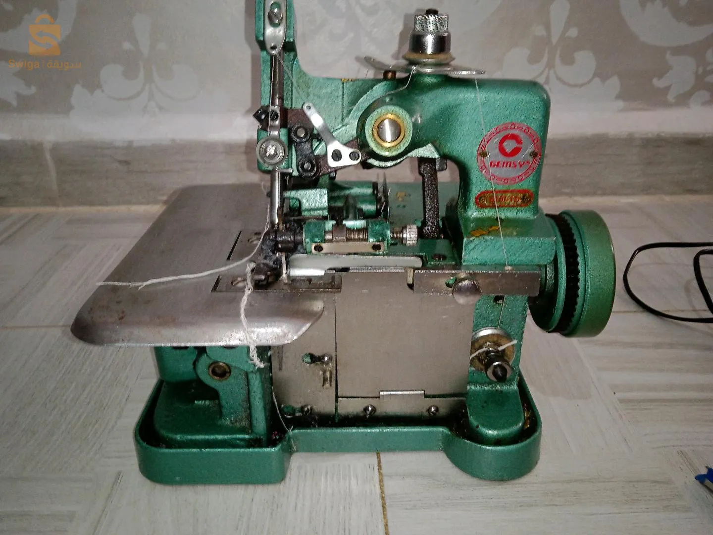 Machine à coudre Surji