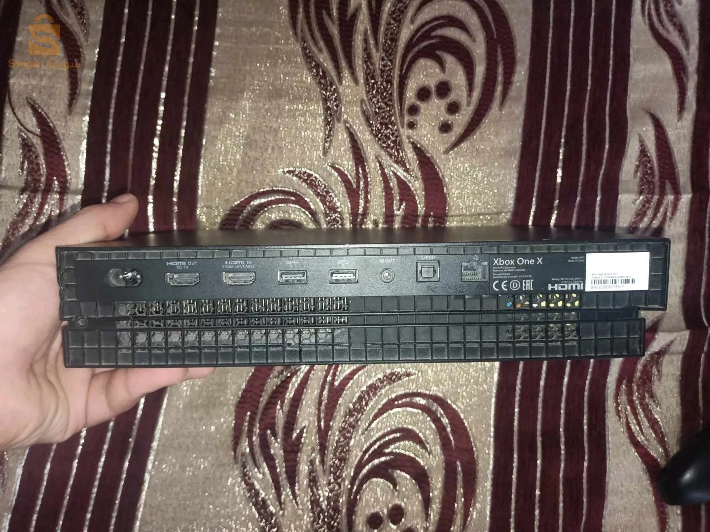 Xbox one x 1tb avec Manette original étet 9/10