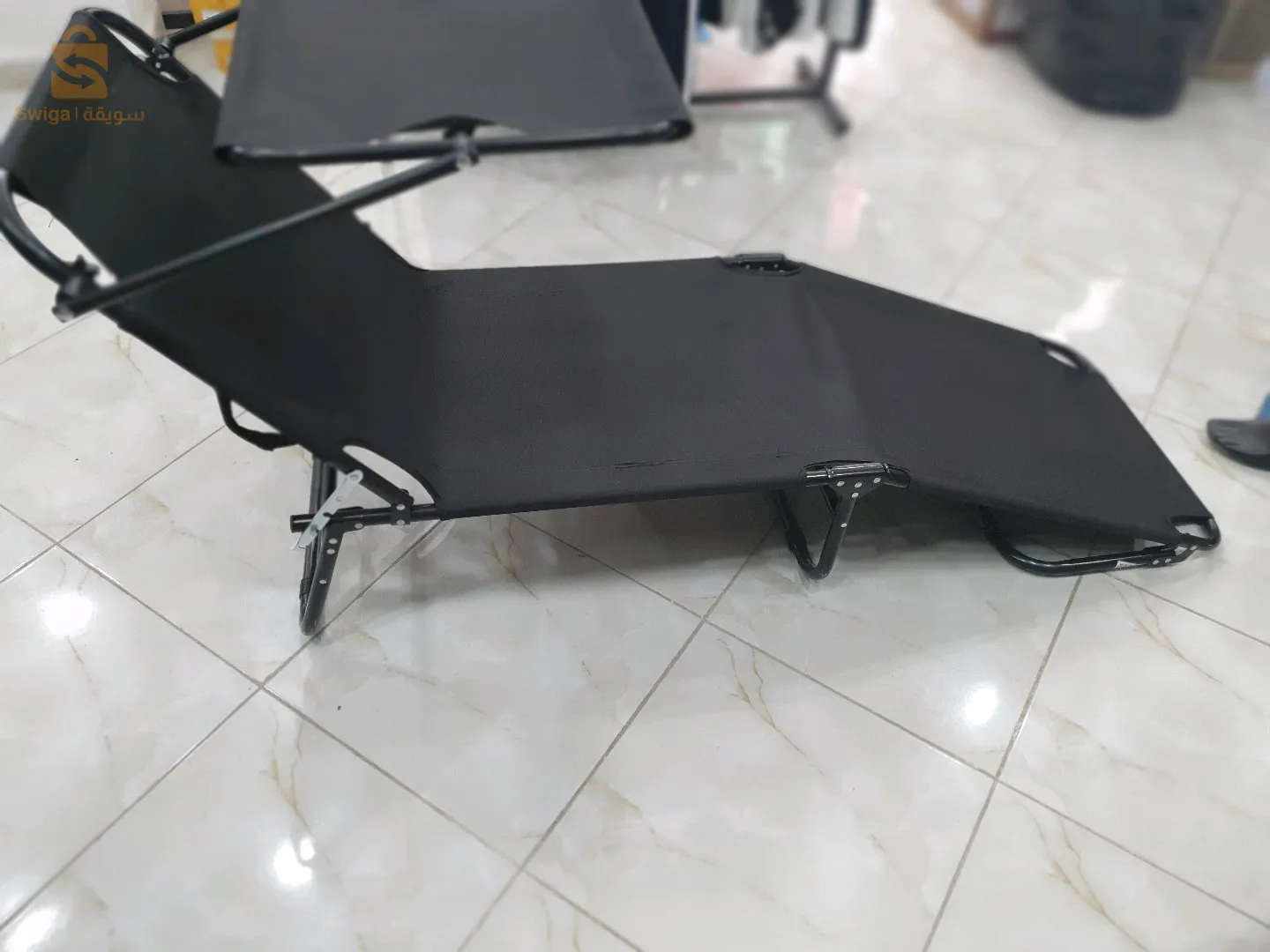 كرسي البحر مزود بمظلة