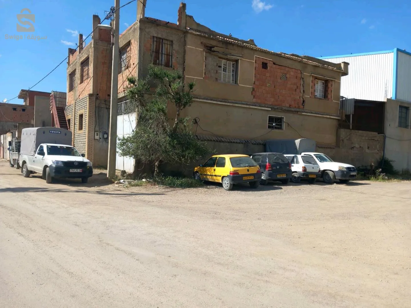 قطعة أرض في مدينة الأربعاء صناعية او سكنية فيها 115آر فيها صوندا  عقد ملكية