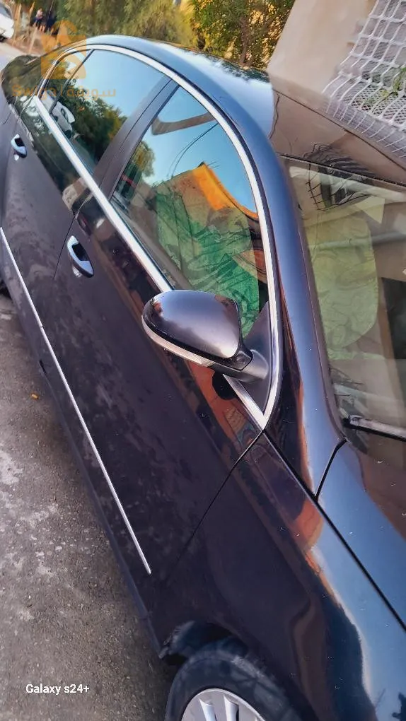 passat B6 noir 2.0 TDI 143ch