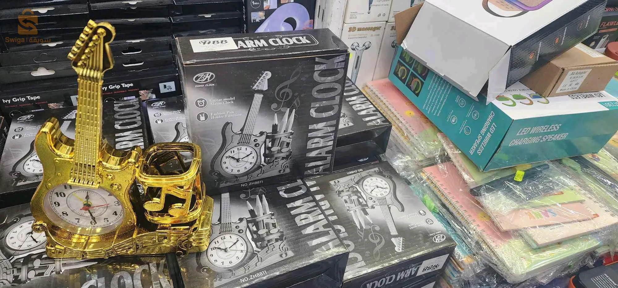 حامل اقلام الكمان+ساعة منبه