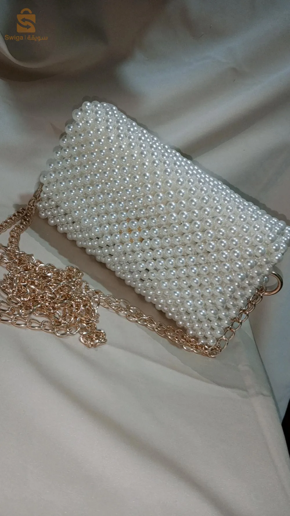 Sak with pearls